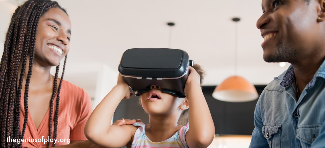 young African American family playing together with a virtual reality headset