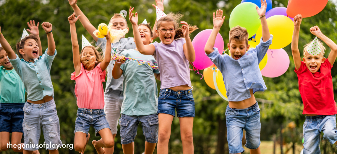 culturally diverse kids playing outdoors with balloons 