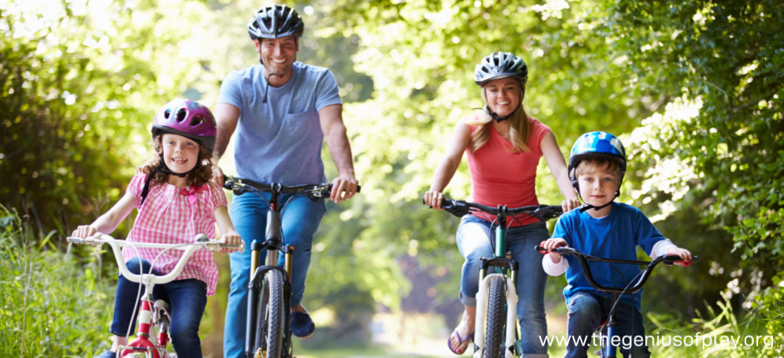 Parents and kids riding bikes outside