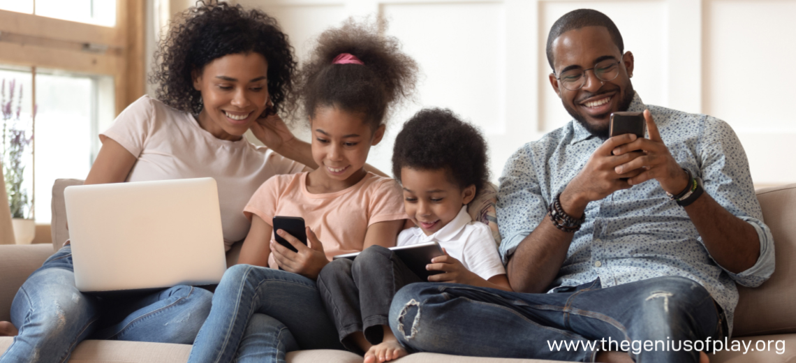 Family with kids relaxing on couch playing on gadgets and screens