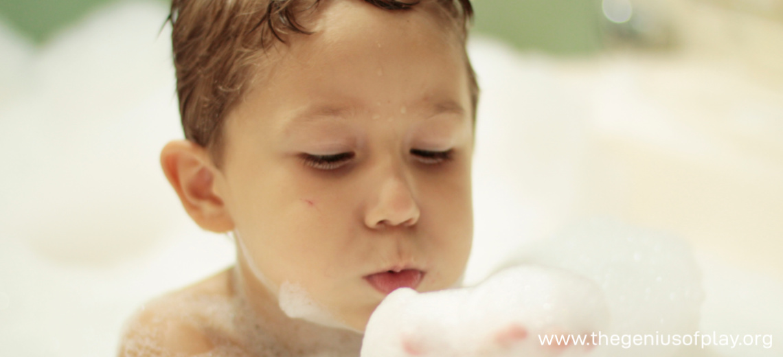 young child in bubble bath