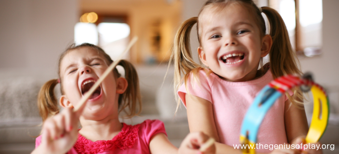 two girls playing and singing with musical instruments